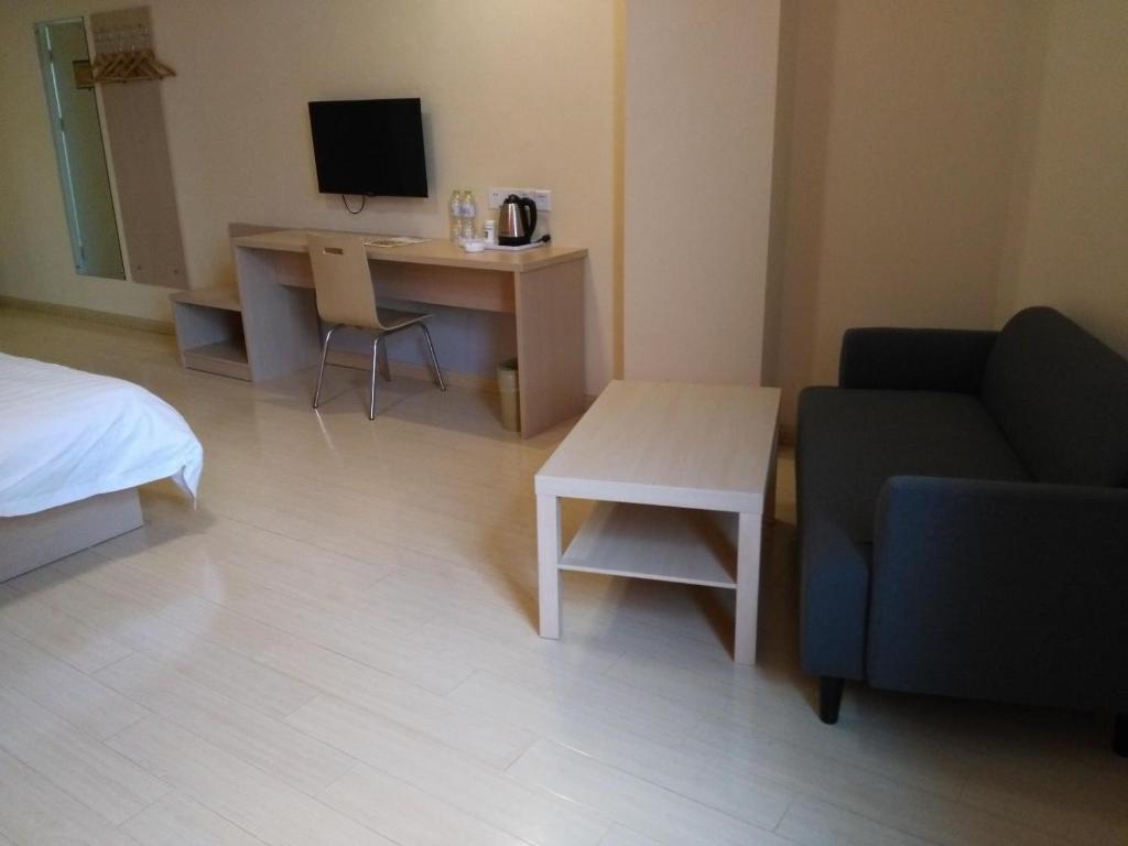 Чжэньцзян: 7Days Inn ZhenJiang Railway Station Wanda Plaza
