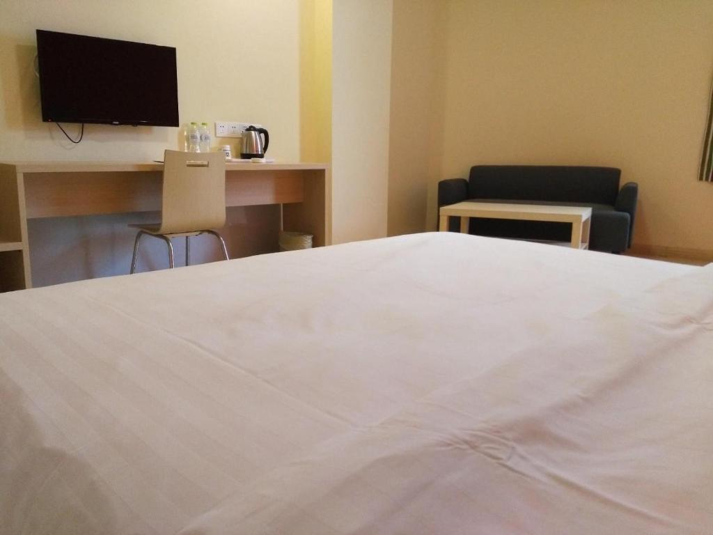 Чжэньцзян: 7Days Inn ZhenJiang Railway Station Wanda Plaza