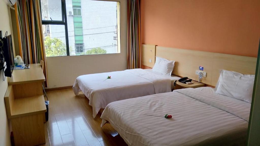 Шанграо: 7Days Inn Yiyang victory road