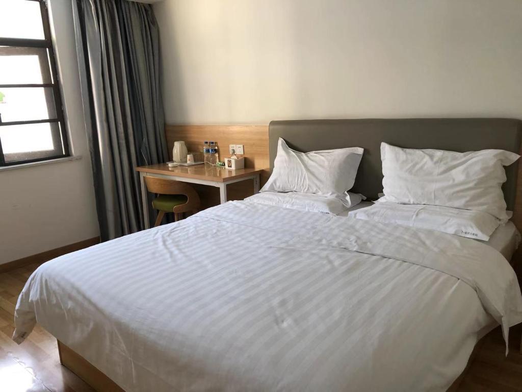 Аньцин: 7Days Inn Anqing Train Station Branch