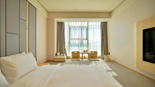 Паниин: JI Hotel Panjin Guangsha Art Street