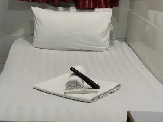 Гонконг: HK New Cosmos Guest House