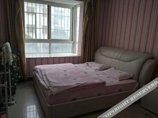 Чжэнчжоу: Zhengzhou QQ Hotel Apartment