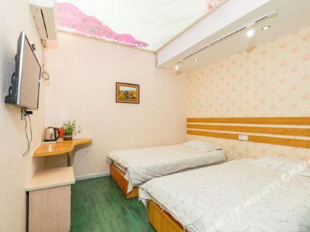Жичжао: 罗曼罗兰连锁宾馆（日照大学城店）
