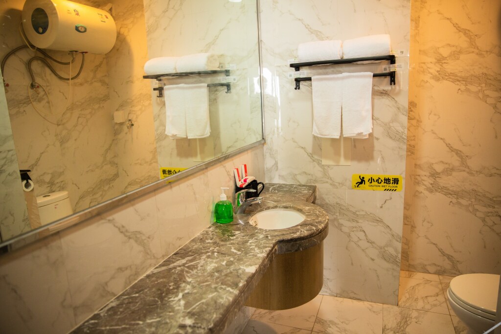 Джиангме: Buyiyang Apartment Hotel