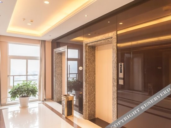 Уху: Chengpin Business Hotel