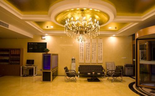Хецзе: JUNYI Hotel Shandong Heze Dongming County Government Building