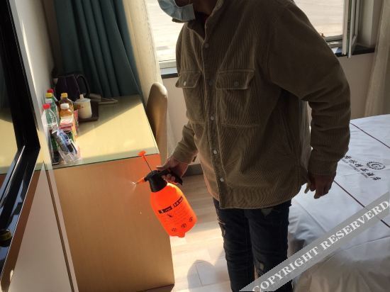 Даньдун: 海城格林精品酒店