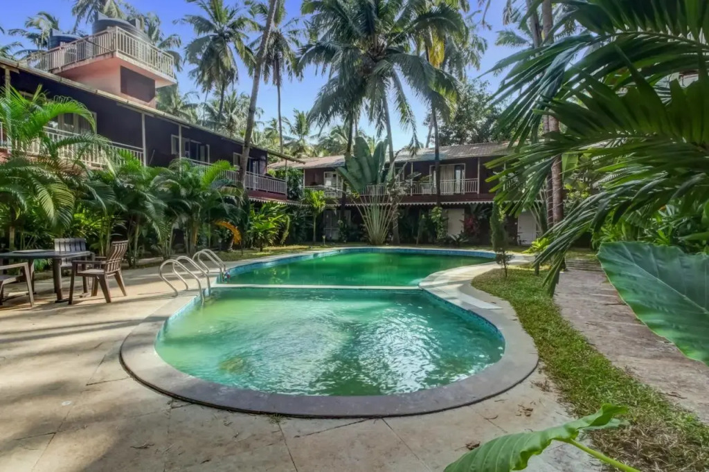 Морджим: Capital O 70228 Coco Farm Resort