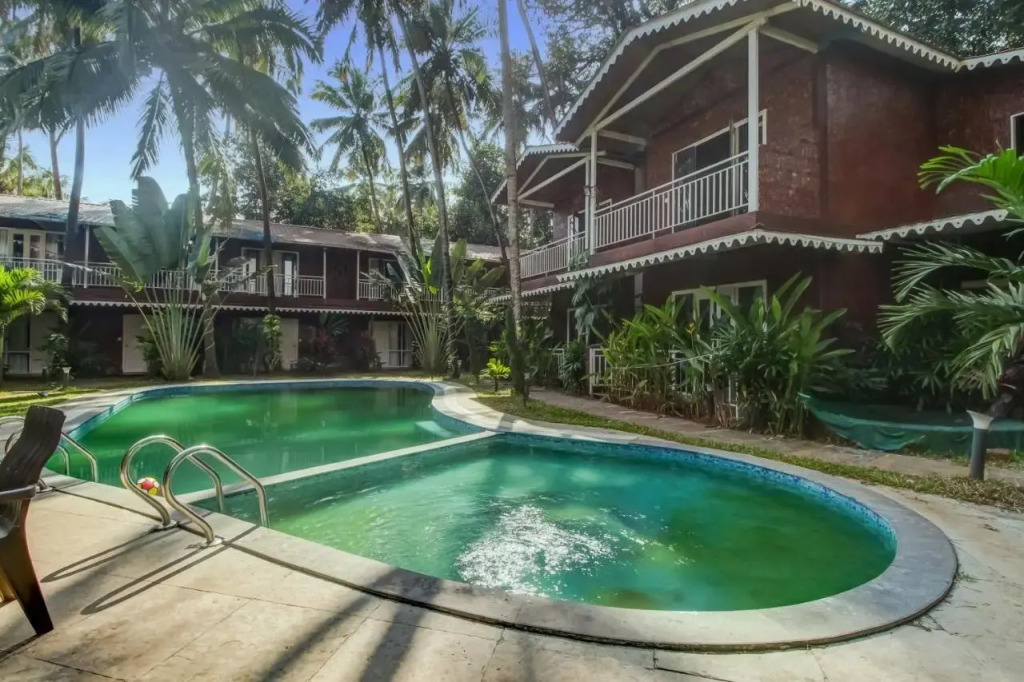 Морджим: Capital O 70228 Coco Farm Resort