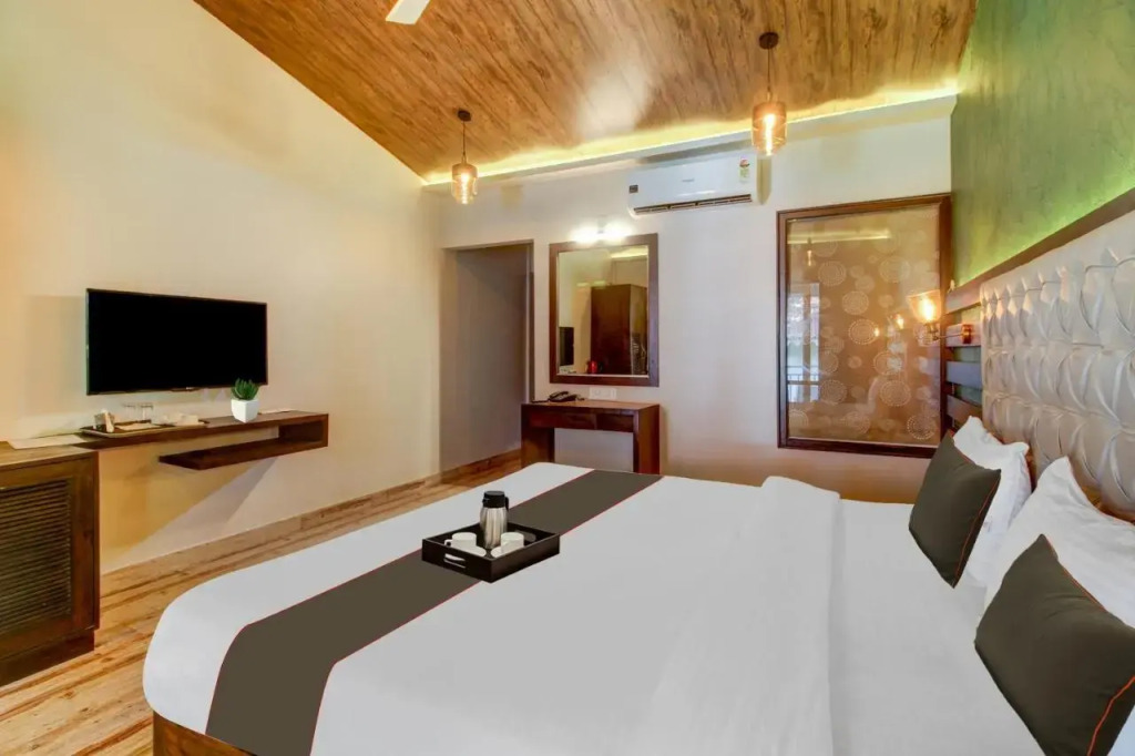 Морджим: Capital O 70228 Coco Farm Resort