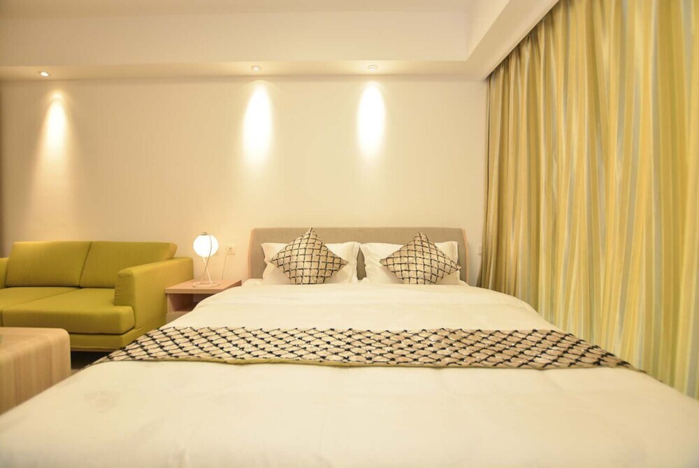 Циньхуандао: Qinhuangdao Tinghaiju Seaview Apartment