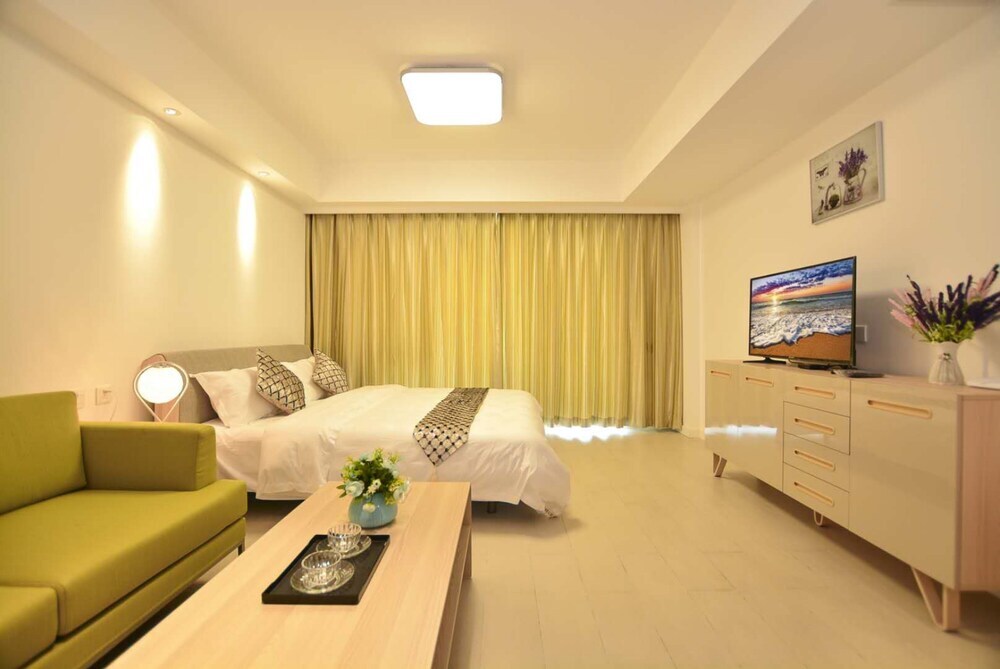 Циньхуандао: Qinhuangdao Tinghaiju Seaview Apartment