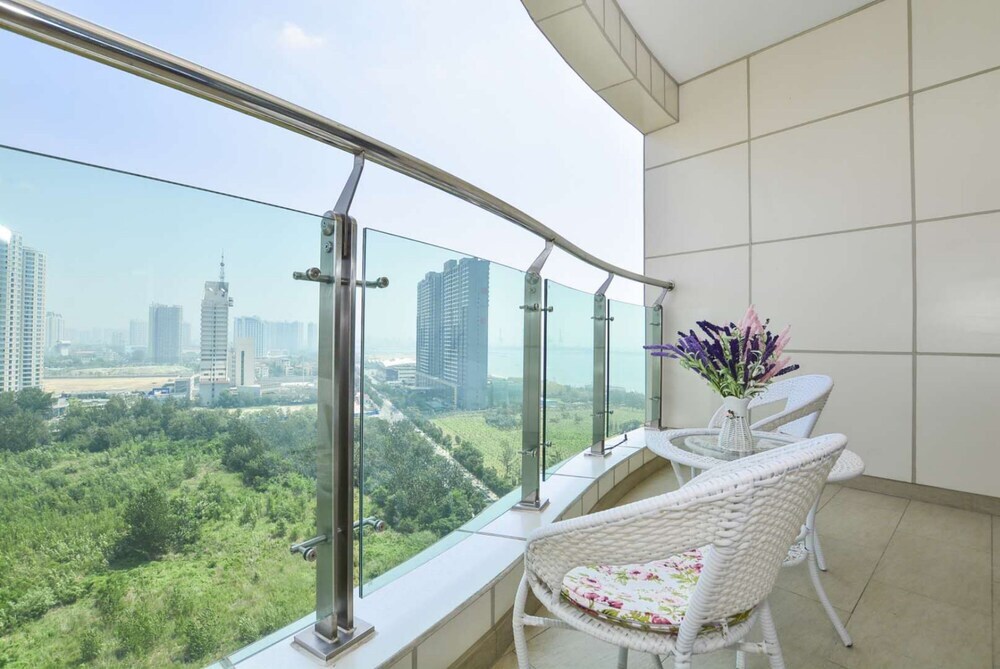 Циньхуандао: Qinhuangdao Tinghaiju Seaview Apartment