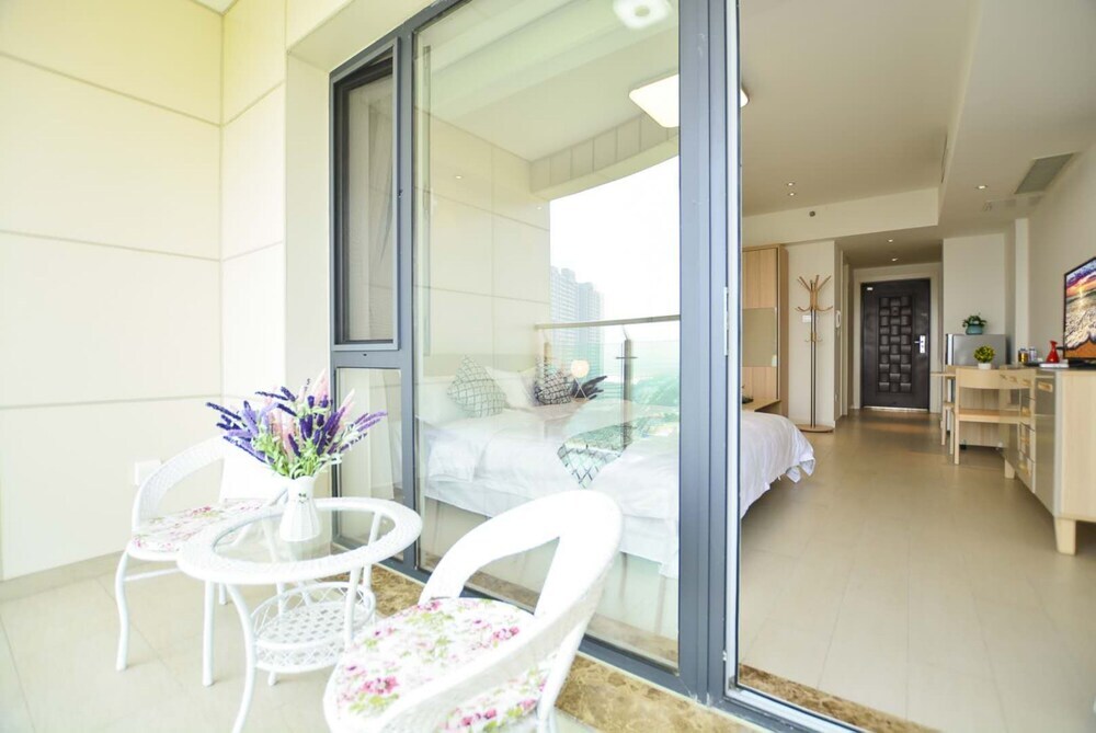 Циньхуандао: Qinhuangdao Tinghaiju Seaview Apartment