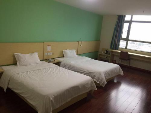 Янгиианг: 7 Days Inn Yangjiang Yangdong Time Square Shopping Mall Branch