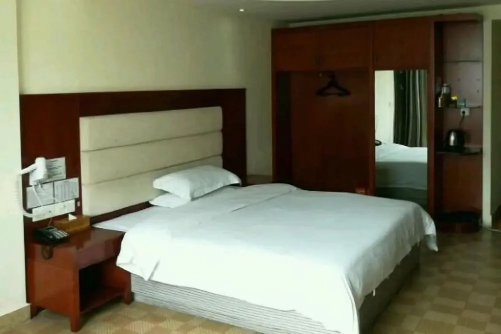 Хейан: Longchuan 51 Orchard Hotel