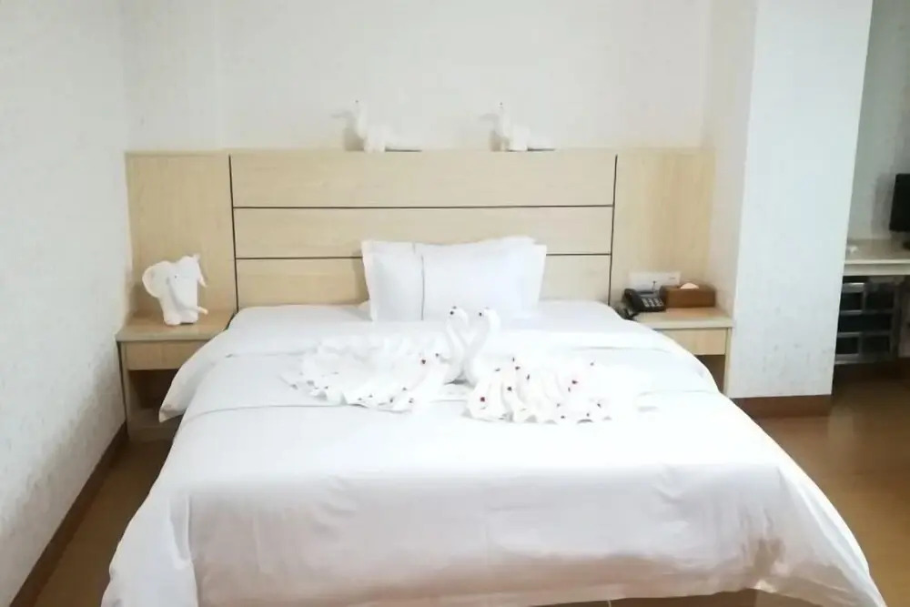 Хейан: Longchuan 51 Orchard Hotel