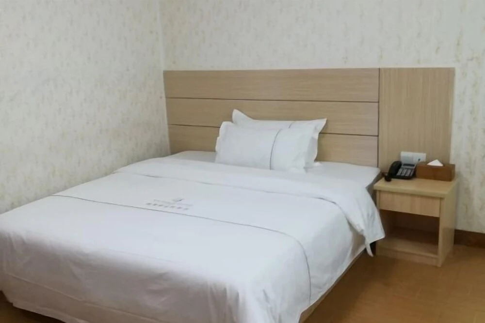 Хейан: Longchuan 51 Orchard Hotel