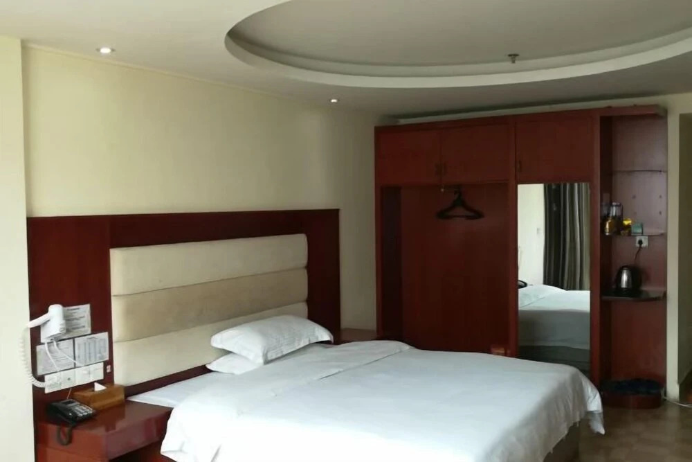 Хейан: Longchuan 51 Orchard Hotel