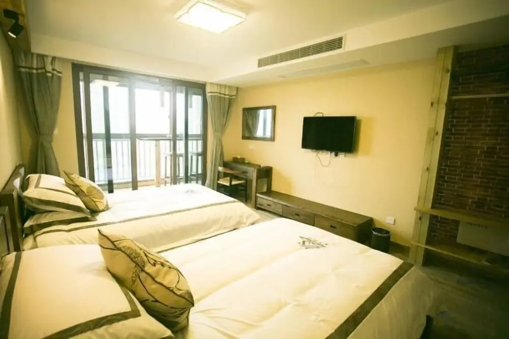 Чжоушань: Qingnian Yuesha Holiday Apartment