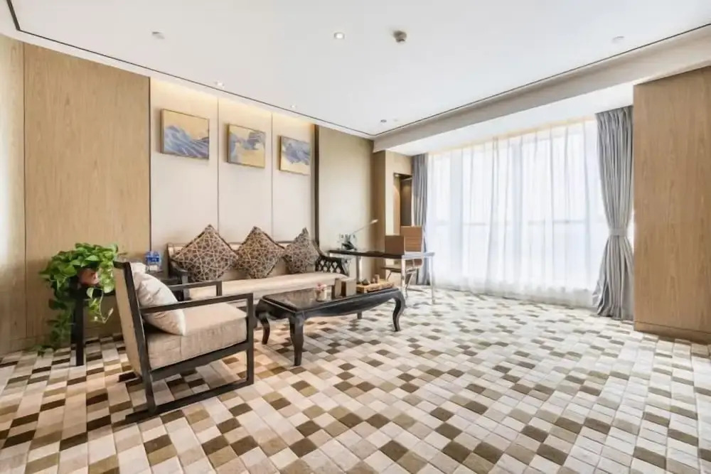Гуюань: Huaqi Earl Hotel