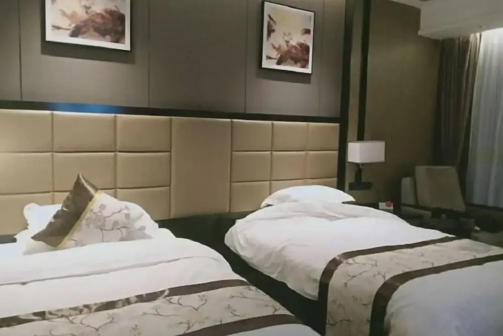 Гуюань: Huaqi Earl Hotel