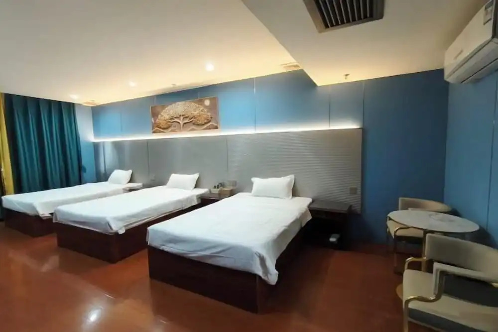 Чжаоцин: Zhaoqing Dengfeng Business Hotel B