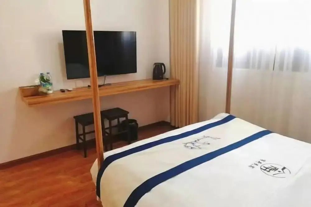 Линьань: Jianshui Shijing Homestay