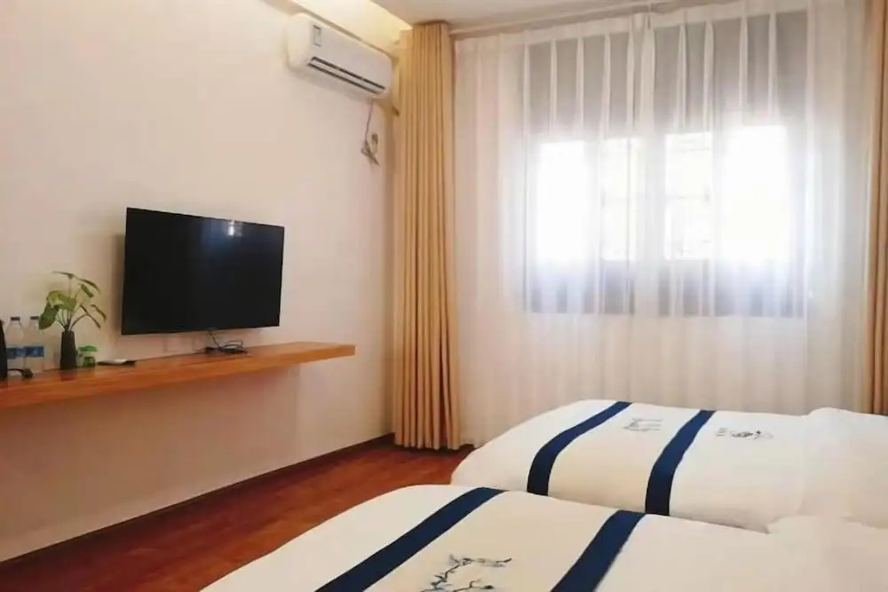 Линьань: Jianshui Shijing Homestay