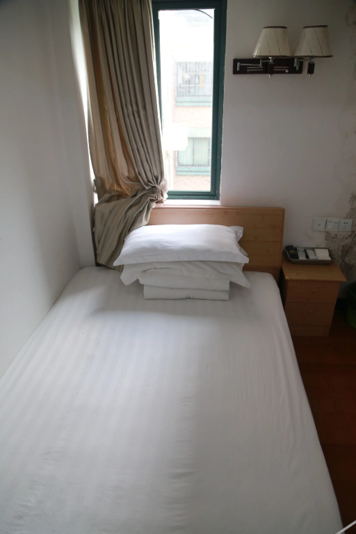 Шанхай: Xingxing Hostel