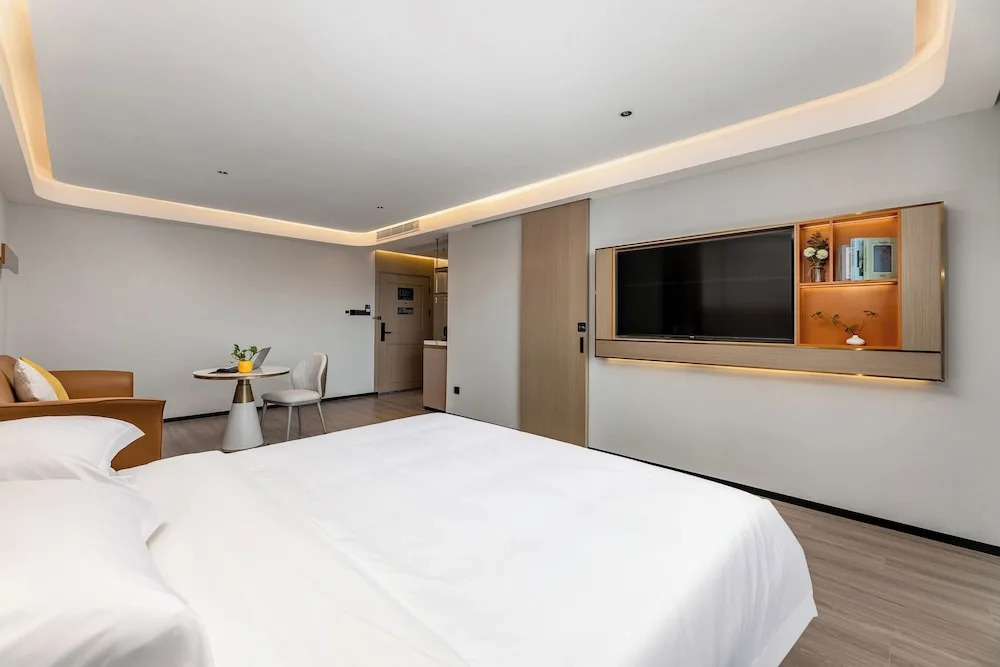 Фошань: Poltton International Apartment Gaoming