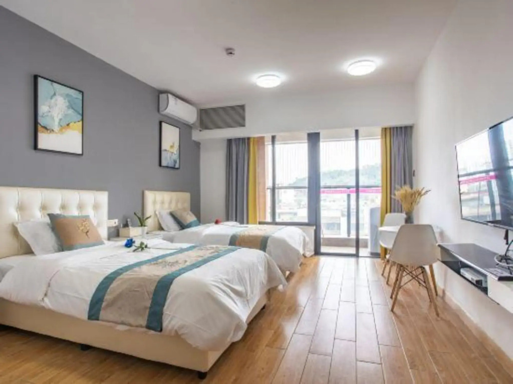Хойчжоу: Tianqin Mushang Hotel Apartment (Huizhou Central Hospital West Lake Branch)