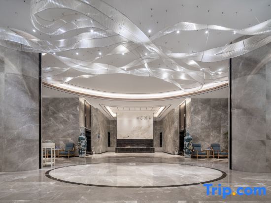 Хотан: Jiuhua Yulong Hotel