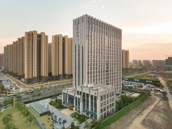 Янчжоу: J hotel (Yizheng passenger station store)