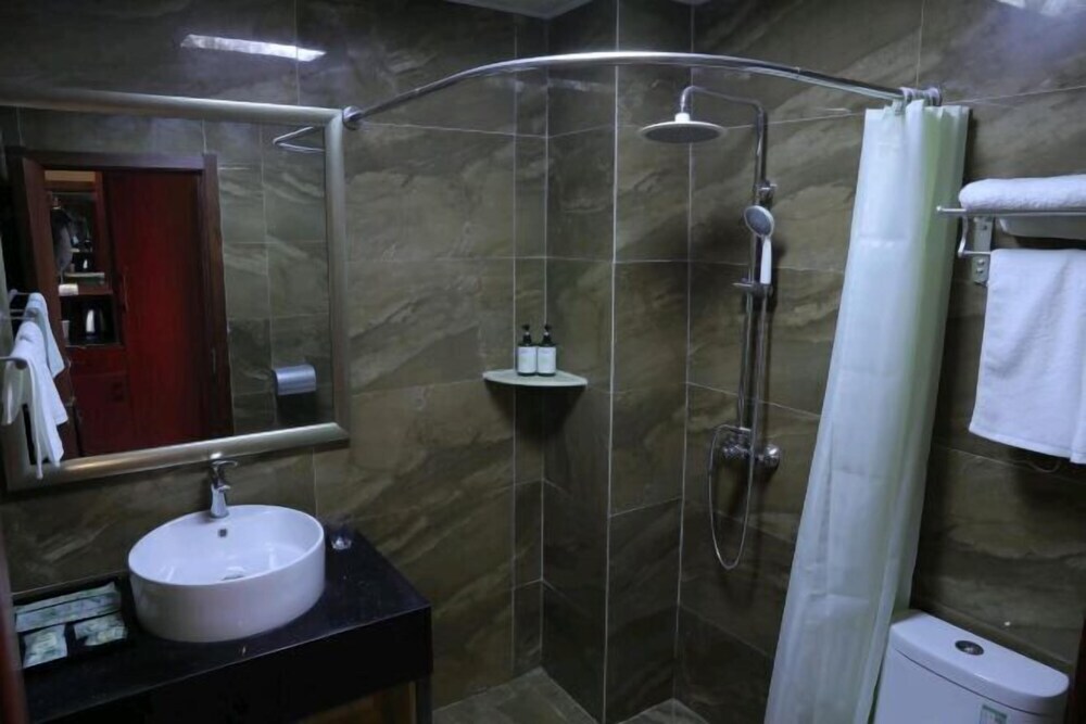 Линьи: Mengcuiyuan Hotel