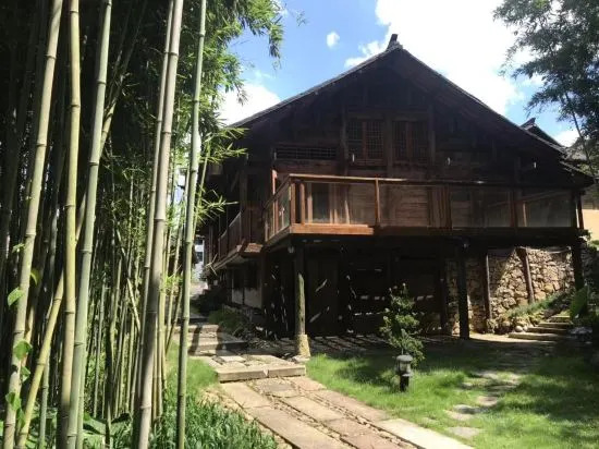 Либо: Shuipuli Xiaoxigu Boutique Hostel