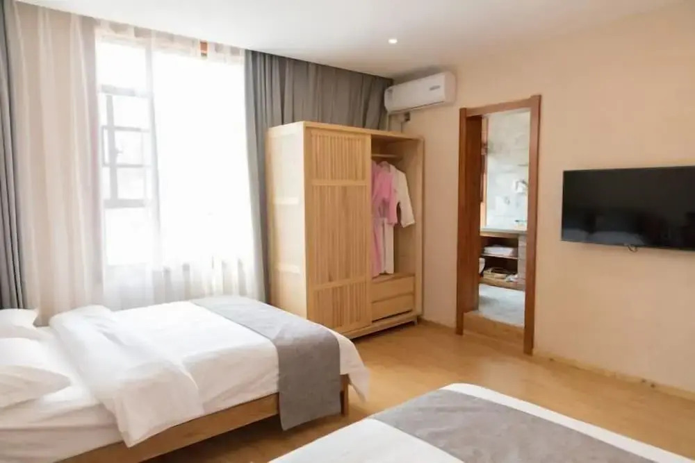 Синъи: Manman Qingfeng Hostel
