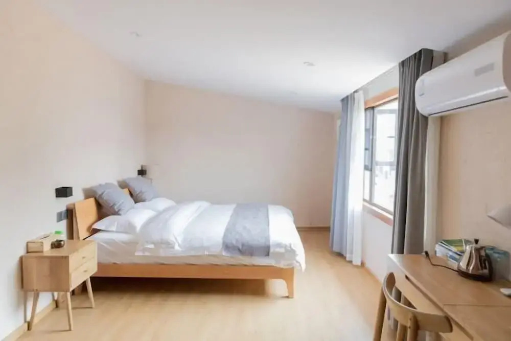 Синъи: Manman Qingfeng Hostel