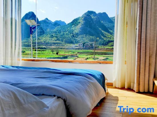 Синъи: Wanfenglin Yueran Boutique Hostel