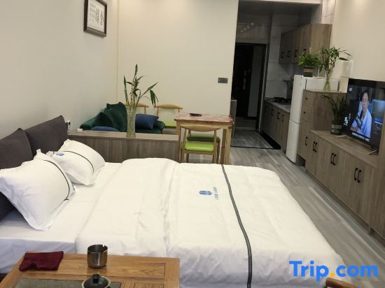 Юнчжоу: Yongzhou Sanhe Business Apartment