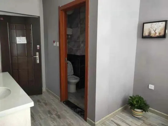 Мишань: Aizhijia Hostel