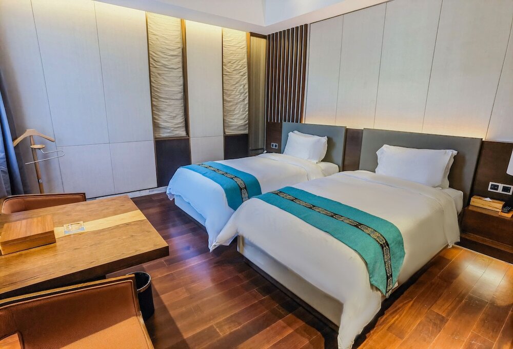 Ваньнин: wanningnanyanwanhaiyabieshuhotel