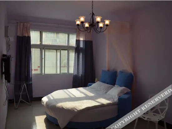 Чжэнчжоу: Xinzheng Oak House Hotel (Baoxiang Temple Shengda University Branch)