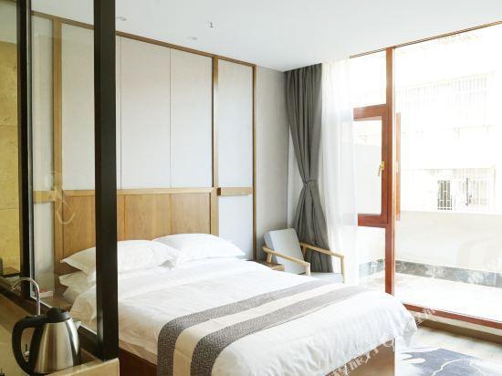 Энле: Chuanqi Hotel