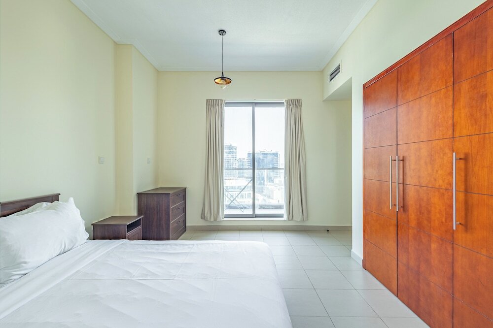 Дубай: SuperHost - Chic Downtown Living 1BR in Dubai's South Ridge 5