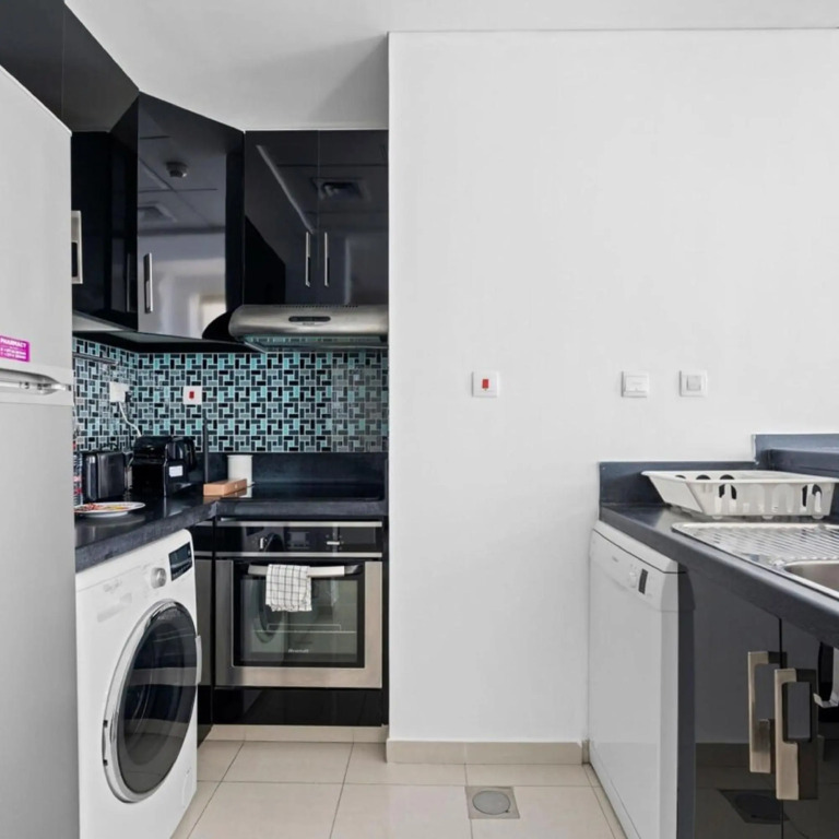 Дубай: Beautiful 1BR with sunset view