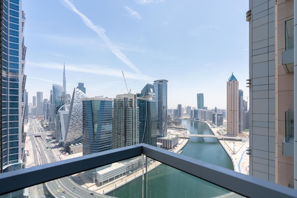Дубай: SuperHost - Luxury Apt with Panoramic Burj and Canal Views