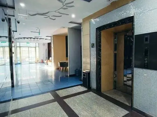 Харбин: Huayi Hotel (Harbin CapitaLand Airport Bus Station)