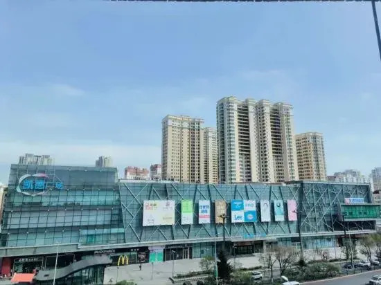 Харбин: Huayi Hotel (Harbin CapitaLand Airport Bus Station)